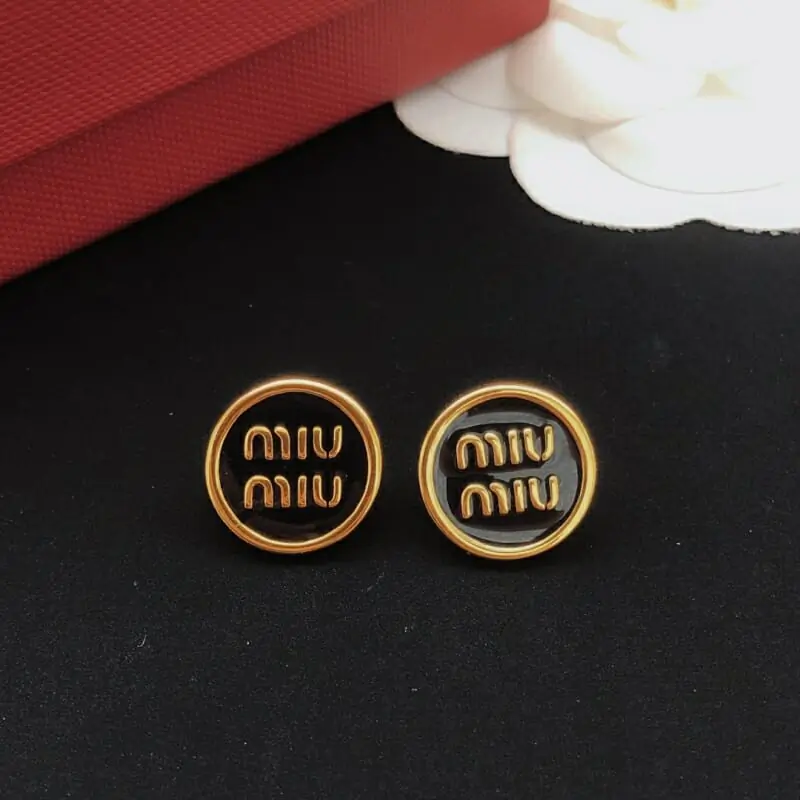 miu miu boucles doreilles pour femme s_12631553